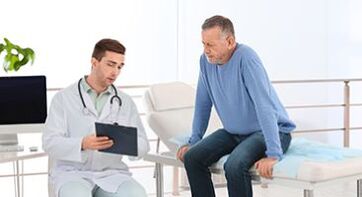 Doctor talks to patient